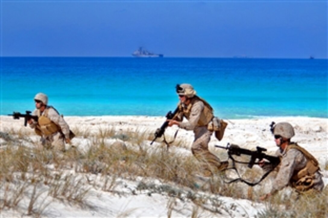 U.S. Marines  take tactical positions during an amphibious beach assault demonstration during 
Exercise Bright Star 2009, Alexandria, Egypt, Oct. 12, 2009. The Marines are assigned to the 22nd Marine Expeditionary Unit. The multinational exercise is designed to improve readiness and interoperability among U.S., Egyptian and participating forces.