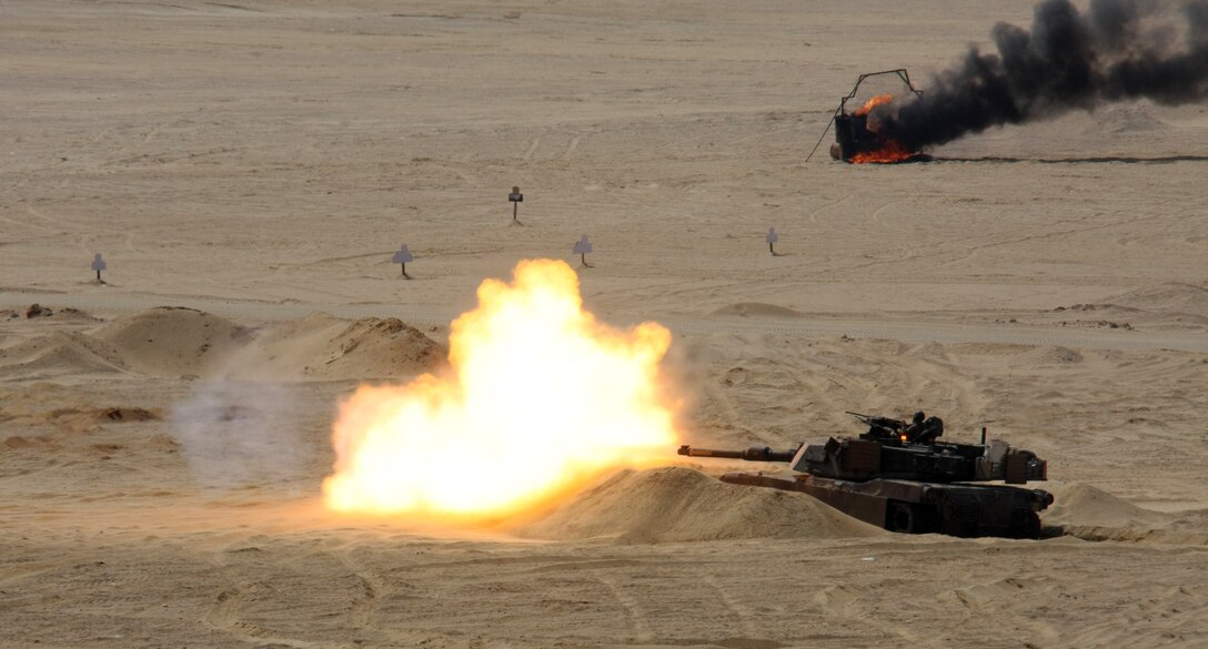 A1 Abrams main battle tank attached to India Company, Battalion Landing Team, 3rd Battalion, 2nd Marine Regiment, 22nd Marine Expeditionary Unit, fires its main gun during a Combined-Arms Live-Fire Exercise conducted as part of Exercise Bright Star 2009 in Egypt, Oct. 14, 2009. The multinational exercise is designed to improve readiness, interoperability, and strengthen the military and professional relationships among U.S., Egyptian and participating forces. Bright Star is conducted by U.S. Central Command and held every two years. Elements of the 22nd MEU are currently are participating in the multi-national exercise while serving as the theater reserve force for U.S. Central Command.::r::::n::(Official Marine Corps photo by Staff Sgt. Matt Epright)::r::::n::