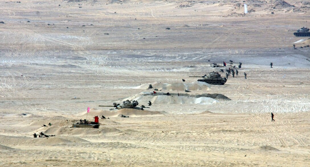 An Egyptian Mechanized Company assaults multiple targets during a Combined-Arms Live-Fire Exercise conducted as part of Exercise Bright Star 2009 in Egypt, Oct. 14, 2009. The multinational exercise is designed to improve readiness, interoperability, and strengthen the military and professional relationships among U.S., Egyptian and participating forces. Bright Star is conducted by U.S. Central Command and held every two years. Elements of the 22nd MEU are currently are participating in the multi-national exercise while serving as the theater reserve force for U.S. Central Command.::r::::n::(Official Marine Corps photo by Staff Sgt. Matt Epright)::r::::n::