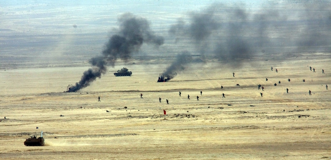 An Egyptian Mechanized Company attacks multiple targets during a Combined-Arms Live-Fire Exercise conducted as part of Exercise Bright Star 2009 in Egypt, Oct. 14, 2009. The multinational exercise is designed to improve readiness, interoperability, and strengthen the military and professional relationships among U.S., Egyptian and participating forces. Bright Star is conducted by U.S. Central Command and held every two years. Elements of the 22nd MEU are currently are participating in the multi-national exercise while serving as the theater reserve force for U.S. Central Command. (Official Marine Corps photo by Staff Sgt. Matt Epright)