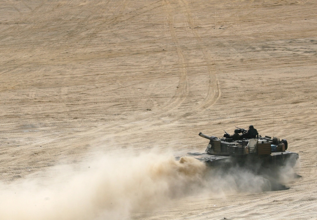 An M1-A1 Abrams Main Battle Tank, attached to India Company, Battalion Landing Team, 3rd Battalion, 2nd Marine Regiment, 22nd Marine Expeditionary Unit, locks onto its target during a Combined-Arms Live-Fire Exercise conducted as part of Exercise Bright Star 2009 in Egypt, Oct. 14, 2009. The multinational exercise is designed to improve readiness, interoperability, and strengthen the military and professional relationships among U.S., Egyptian and participating forces. Bright Star is conducted by U.S. Central Command and held every two years. Elements of the 22nd MEU are currently are participating in the multi-national exercise while serving as the theater reserve force for U.S. Central Command.::r::::n::(Official Marine Corps Photo by Cpl. Theodore W. Ritchie)::r::::n::