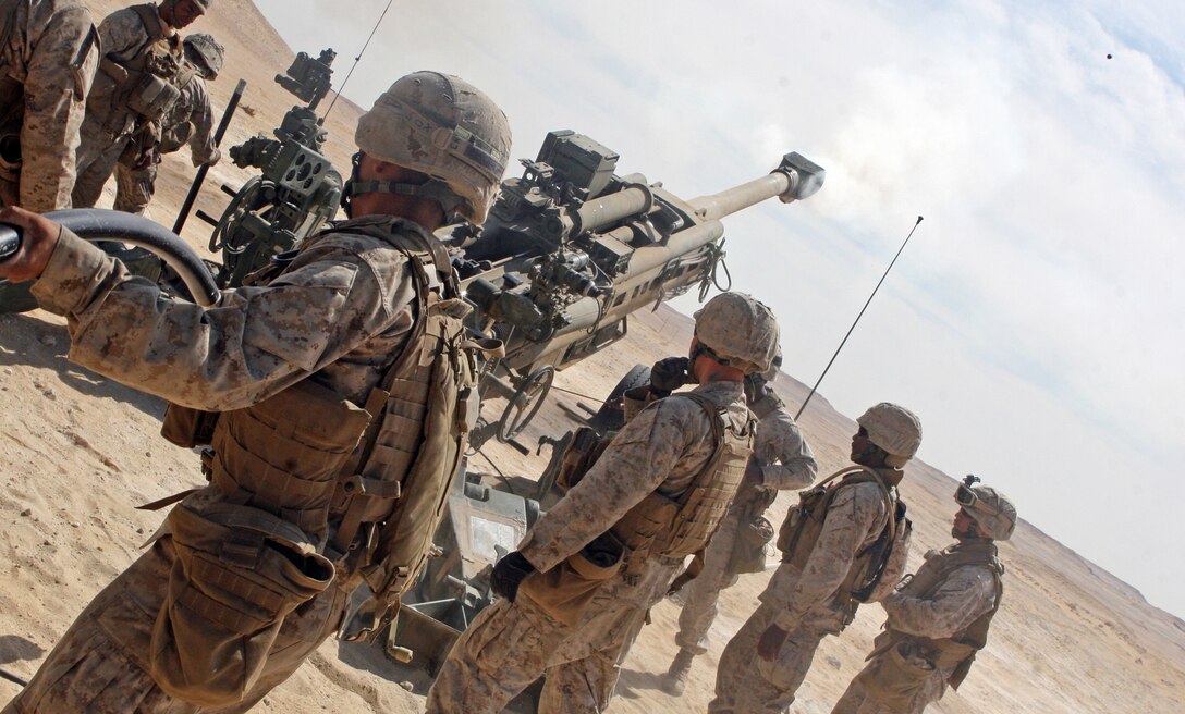 A 155mm round fired from an M777 Howitzer from Sierra Battery, Battalion Landing Team, 3rd Battalion, 2nd Marine Regiment, 22nd Marine Expeditionary Unit, flies downrange during the Combined-Arms Live-Fire Exercise conducted as part of Exercise Bright Star 2009 in Egypt, Oct. 14, 2009. The multinational exercise is designed to improve readiness, interoperability, and strengthen the military and professional relationships among U.S., Egyptian and participating forces. Bright Star is conducted by U.S. Central Command and held every two years. Elements of the 22nd MEU are currently are participating in the multi-national exercise while serving as the theater reserve force for U.S. Central Command.::r::::n::(Official Marine Photo by Lance Cpl. David Castillo)::r::::n::