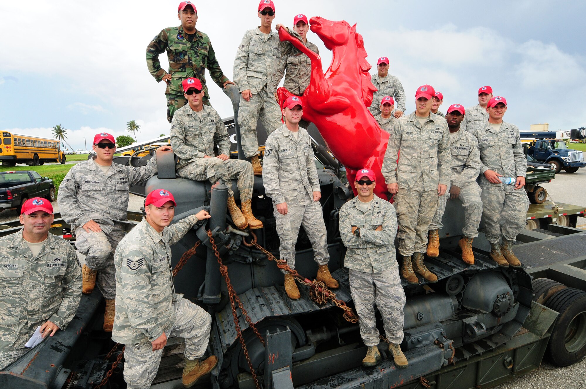 ANDERSEN AIR FORCE BASE, Guam -Members of the 554th RED HORSE Squadron pose for a photo before participating in a parade Oct. 16 here. The parade honored the 554th RHS' 44th birthday. The 554th RHS is the oldest RED HORSE squadron in the Air Force. (U.S. Air Force photo by Airman 1st Class Julian North)
