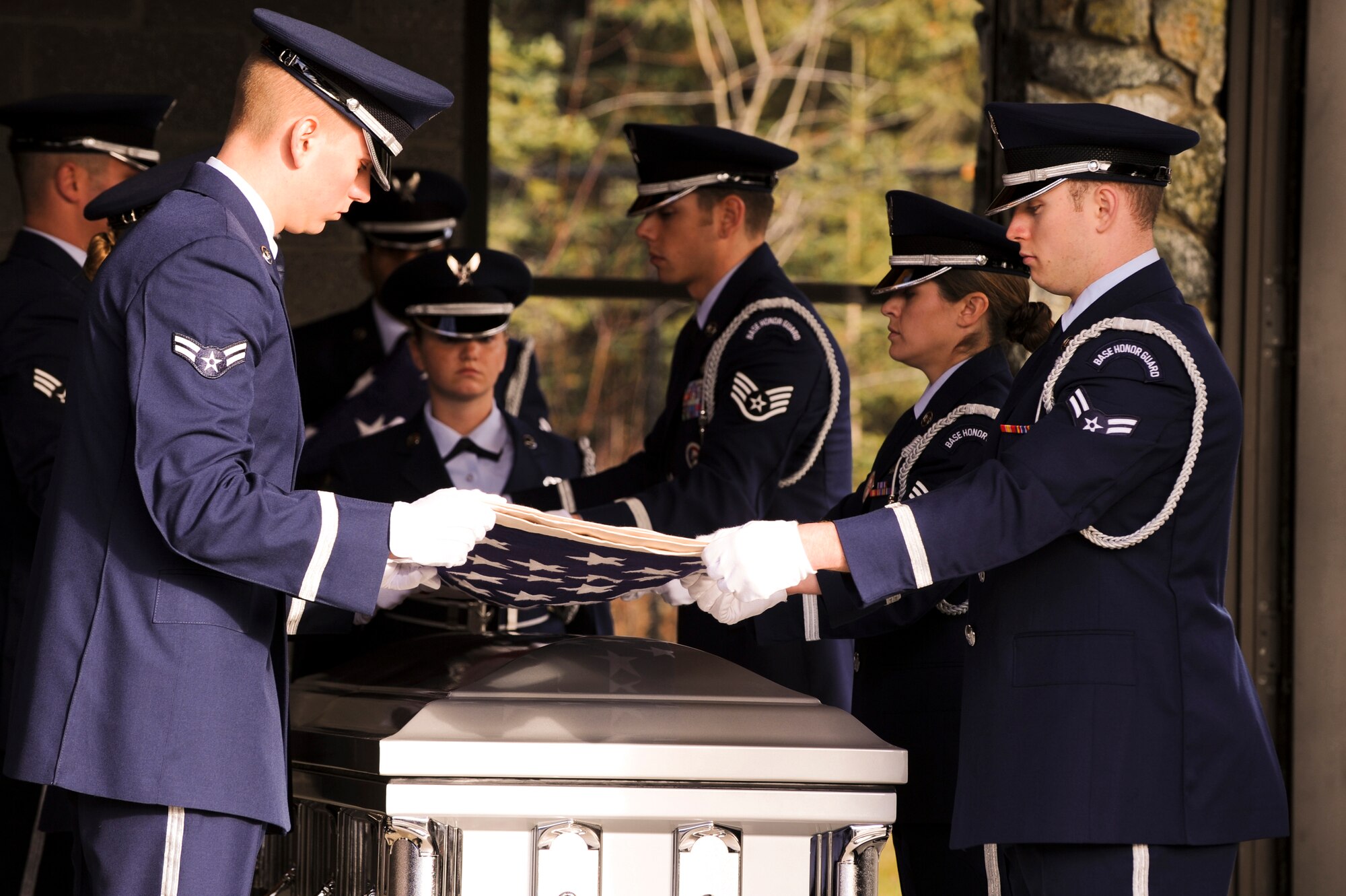 FORT RICHARDSON, Alaska -- Members of the Elmendorf Air Force Base Honor Guard fold a flag during the funeral service for Staff Sgt. Shawn Rankin, here at the Fort Richardson Cemetery Oct. 15. Rankin of Anchorage, Alaska, was assigned to the 56th Aircraft Maintenance Squadron and served as an F-16 Fighting Falcon crew chief at Luke Air Force Base, Ariz. (U.S. Air Force photo/Staff Sgt. Joshua Garcia)