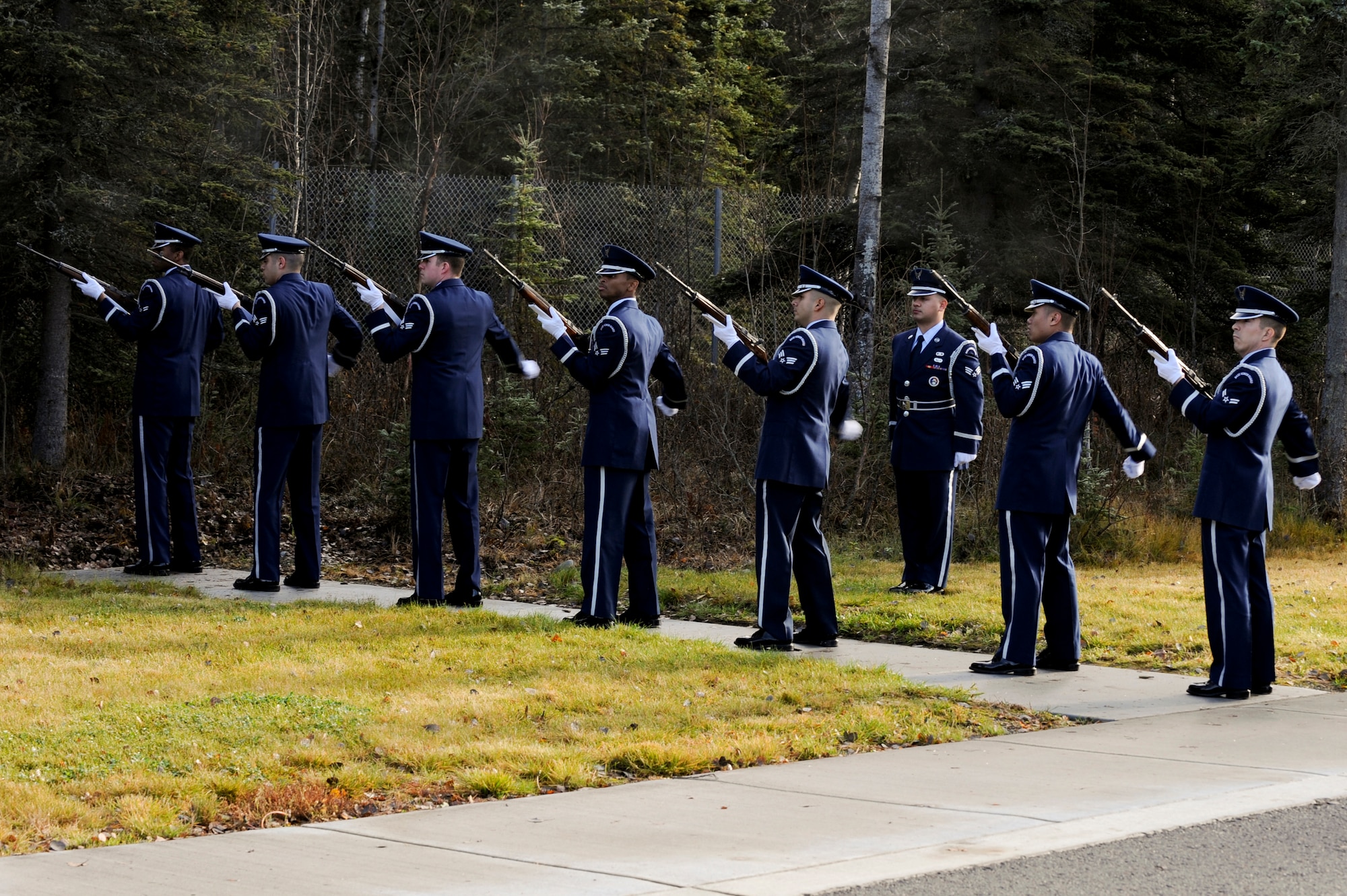 FORT RICHARDSON, Alaska -- Members of the Elmendorf Air Force Base Honor Guard perform a 21-gun salute during the funeral service for Staff Sgt. Shawn Rankin, here at the Fort Richardson National Cemetery Oct. 15. Rankin of Anchorage, Alaska, was assigned to the 56th Aircraft Maintenance Squadron and served as an F-16 Fighting Falcon crew chief at Luke Air Force Base, Ariz. (U.S. Air Force photo/Staff Sgt. Joshua Garcia)