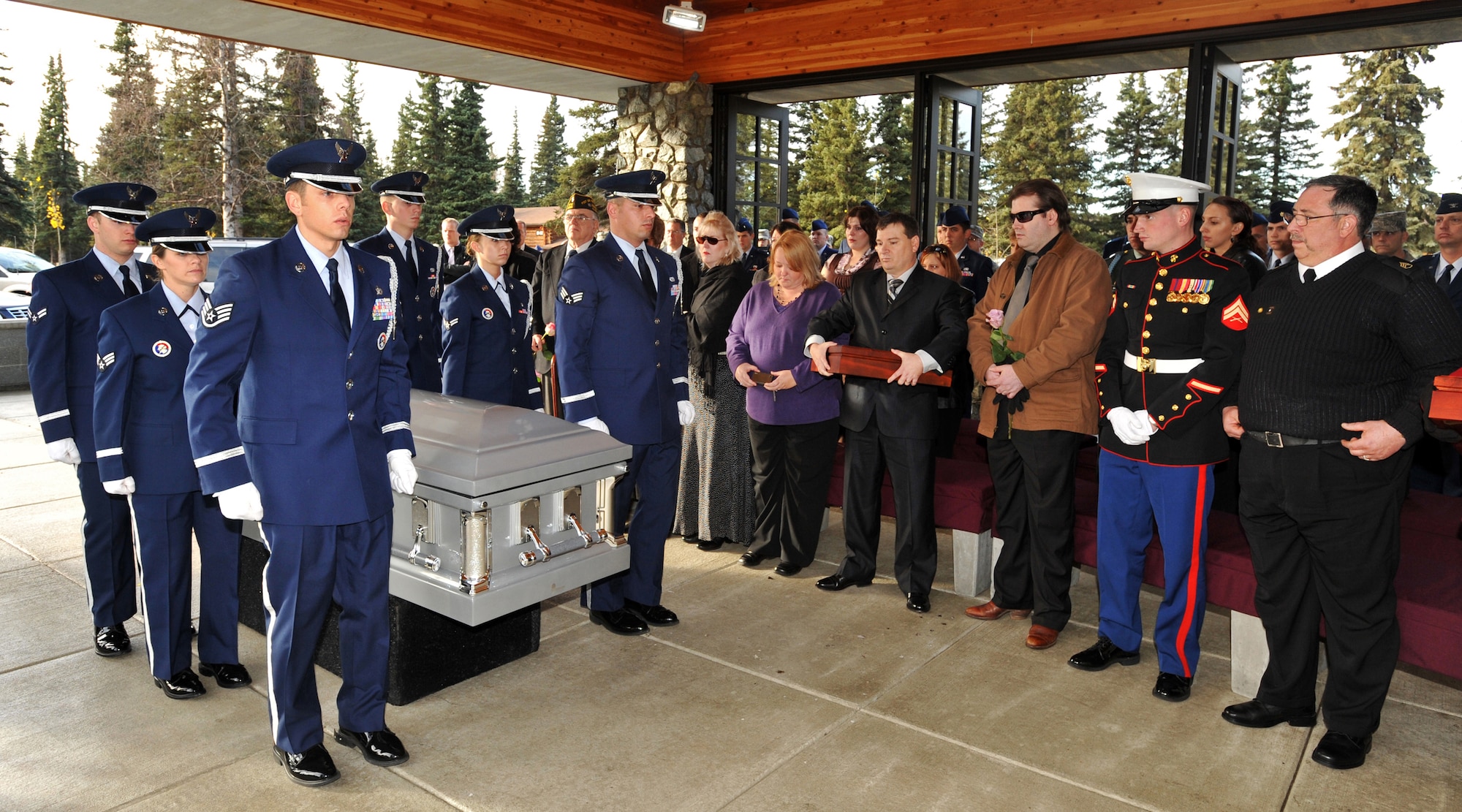 FORT RICHARDSON, Alaska -- Members of the Elmendorf Air Force Base Honor Guard prepare to transfer the coffin of Staff Sgt. Shawn Rankin during the funeral service here at the Fort Richardson National Cemetery Oct. 15. Rankin of Anchorage, Alaska, was assigned to the 56th Aircraft Maintenance Squadron and served as an F-16 Fighting Falcon crew chief at Luke Air Force Base, Ariz. (U.S. Air Force photo/Senior Airman Laura Turner)