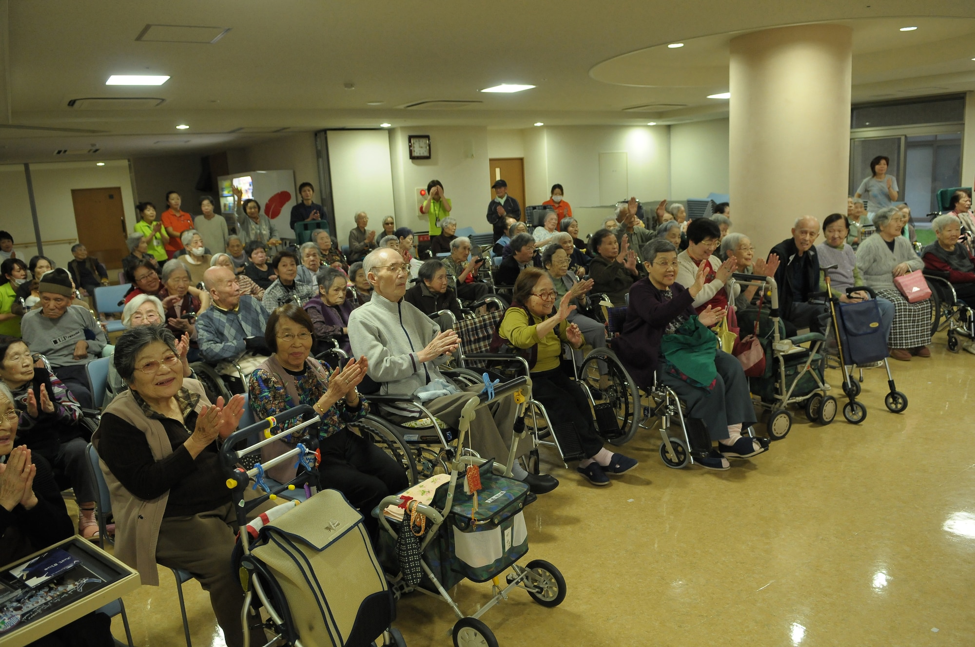 HIROSHIMA, Japan -- Residents of the Yano Orizuru-en nursing home enjoy a performnace by the U.S. Air Force Band of the Pacific-Asia Oct. 14. Constructed only three years ago, the one-of-a-kind home?s residents are all survivors of the Aug. 6, 1945, atomic bomb attack on Hiroshima. Residents range in age from 66 to 107 years and there?s a waiting list of nearly 2,000 to get into the facility. (U.S. Air Force photo/Airman 1st Class Sean Martin)