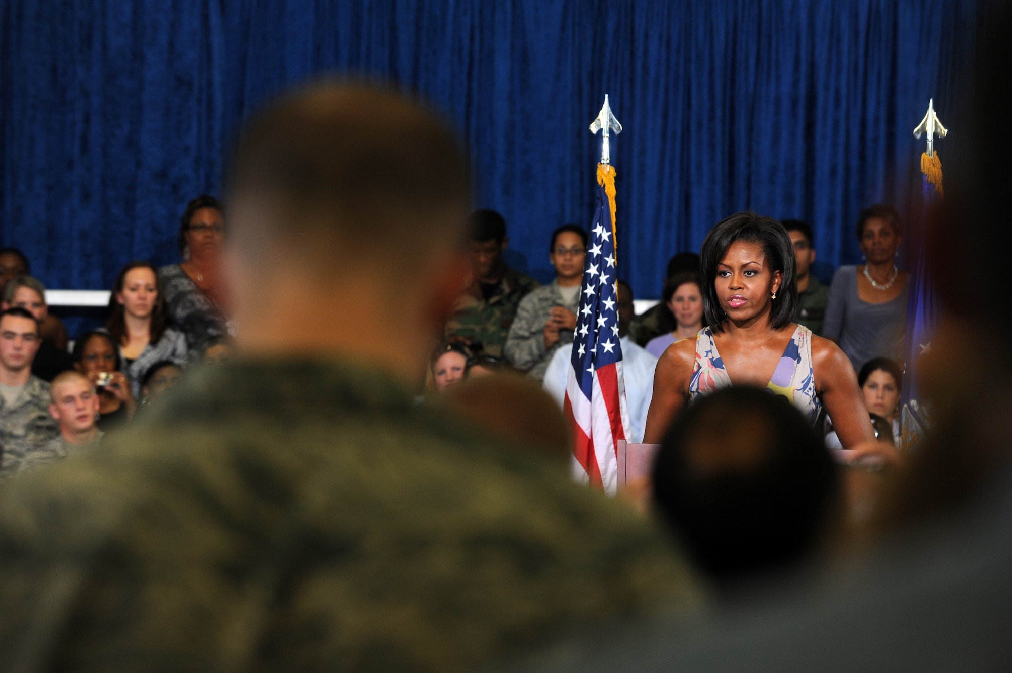 First Lady Michelle Obama speaks to military members and their families at Eglin Air Force Base, Fla., during a visit to the base Oct. 15. Ms. Obama talked about the importance of taking care of families and praised the Air Force for programs like the Year of the Air Force Family. (U.S. Air Force photo/Staff Sgt. Desiree N. Palacios)