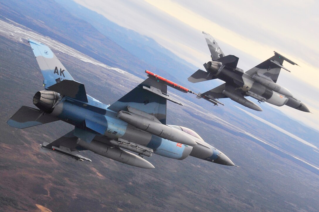 F-16 Fighting Falcon "Aggressors" fly over the Joint Pacific Alaska Range Complex during Red Flag-Alaska Oct. 8, 2009 at Eielson Air Force Base, Alaska. (U.S. Air Force photo/Staff Sgt. Christopher Boitz)