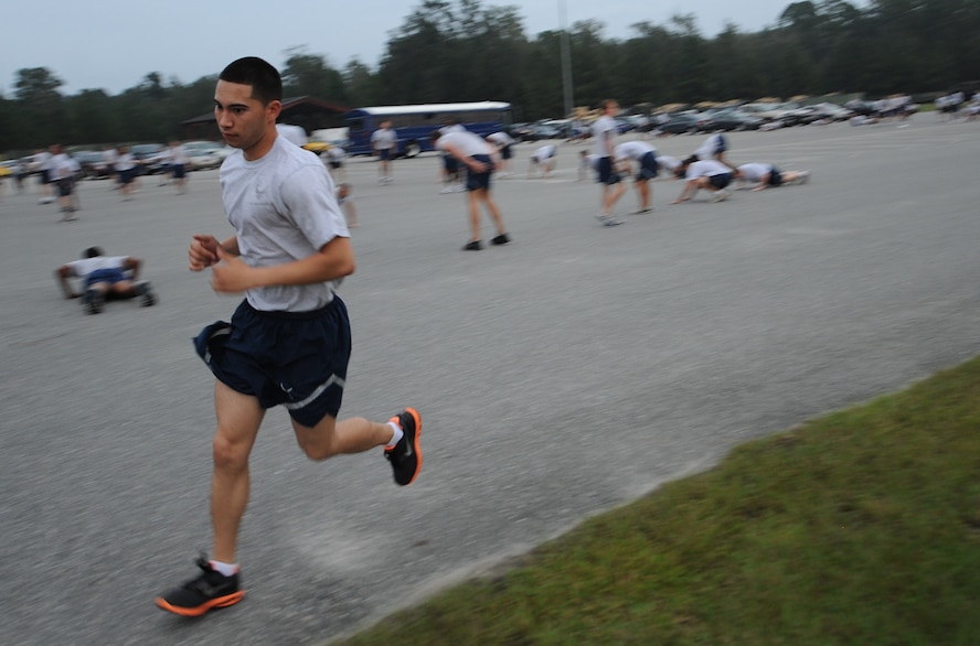 MOODY AIR FORCE BASE, Ga. -- An Airman participating in the Airman 1st Class Leebernard Chavis memorial workout begins the one-mile run portion of the workout here Oct. 14. The workout is to honor Airman Chavis who was killed in combat operations in 2006. (U.S. Air Force photo by Staff Sgt. Elizabeth Rissmiller) 
