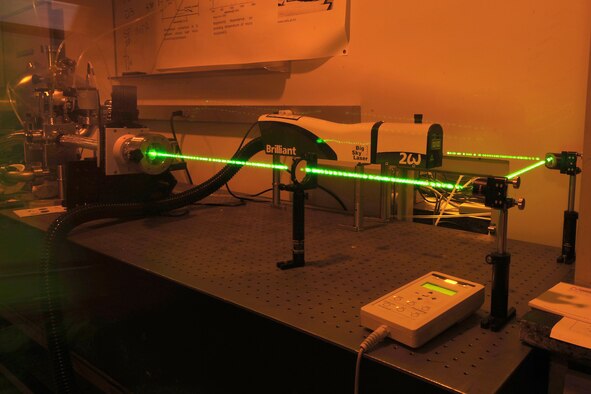 A 200-milliJoule pulse laser fires in this timed exposure Oct. 9, 2009, at the U.S. Air Force Academy in Colorado Springs, Colo. The laser is used for a variety of experiments, including tests to determine how "pushing" sulfur into a silicon-based solar cell increases the cell's efficiency. (U.S. Air Force photo/Rachel Boettcher)