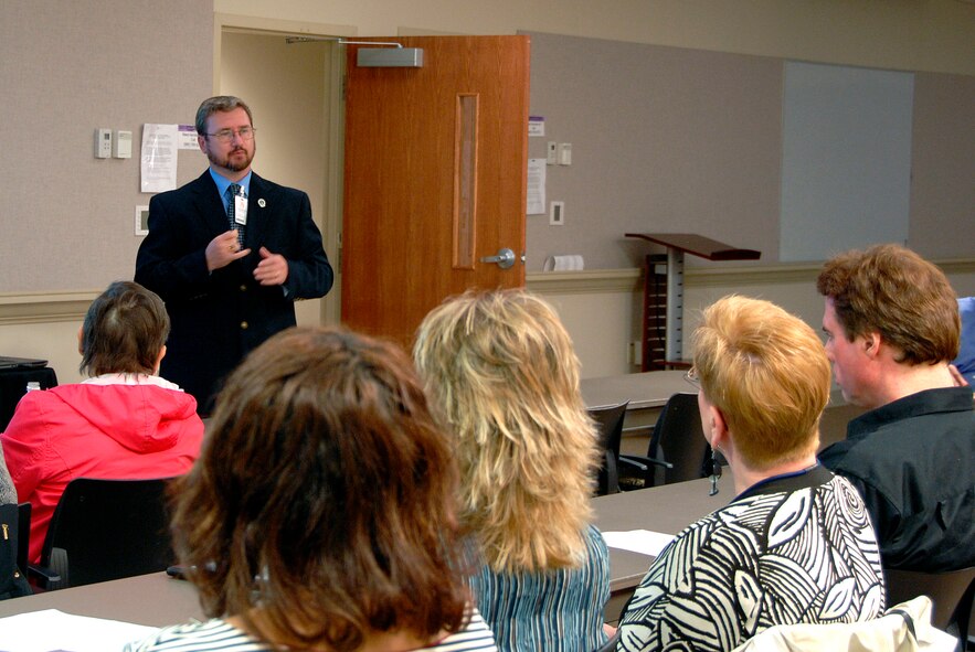 MCGHEE TYSON ANGB, Tenn. -- John Hawk, the Advanced Distributed Learning team lead for the Transformative Education branch at The I.G. Brown Air National Guard Training and Education Center, standing, gives a presentation on "Educating Employees with Disabilities" to Oak Ridge Associated
Universities employees in Oak Ridge, Tenn., Oct. 14, 2009.   Hawk is a hearing-impaired disabled veteran and the presentation was in support of National Disability Employment Awareness Month 2009.  (U.S. Air Force photo by Master Sgt. Kurt Skoglund)(Released)
