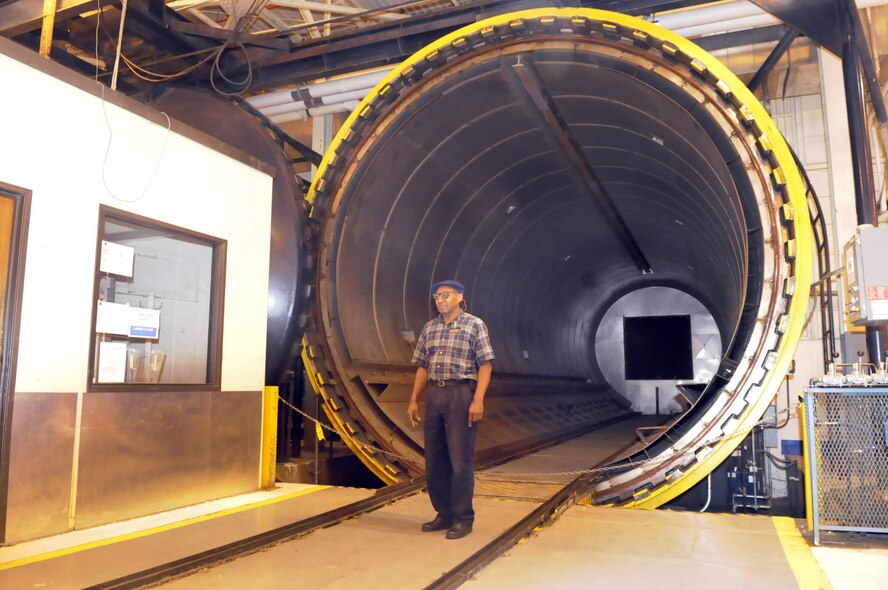 Lucion Foreman walks in front of one of the autoclaves used to bake the C-5 panels. U. S. Air Force photo by Sue Sapp