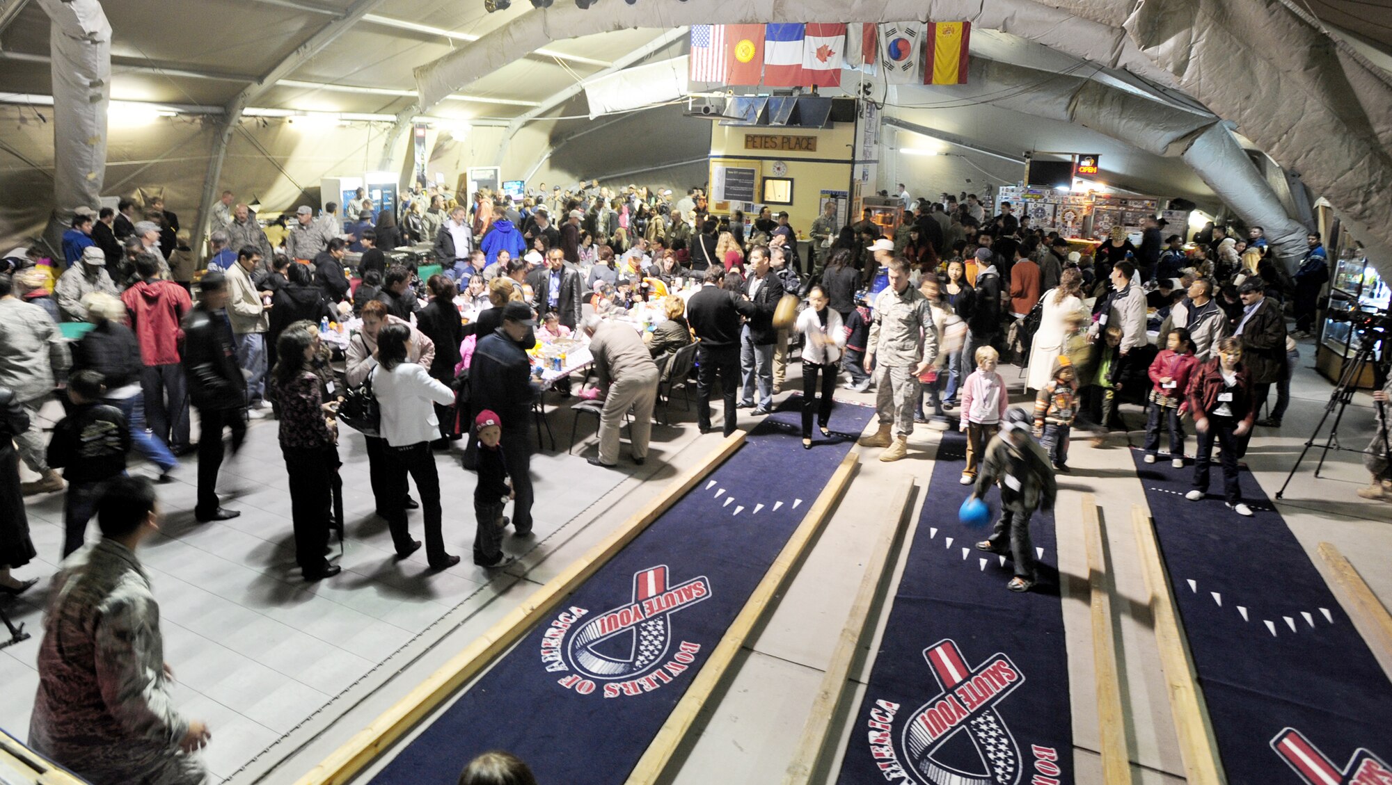 Hundreds of guests participate in games and activities during Friends and Family Day Oct. 9, 2009, at the Transit Center at Manas, Kyrgyzstan. The event strengthened friendships between the U.S. military and the local community. (U.S. Air Force photo/Senior Airman Steele C. G. Britton) 