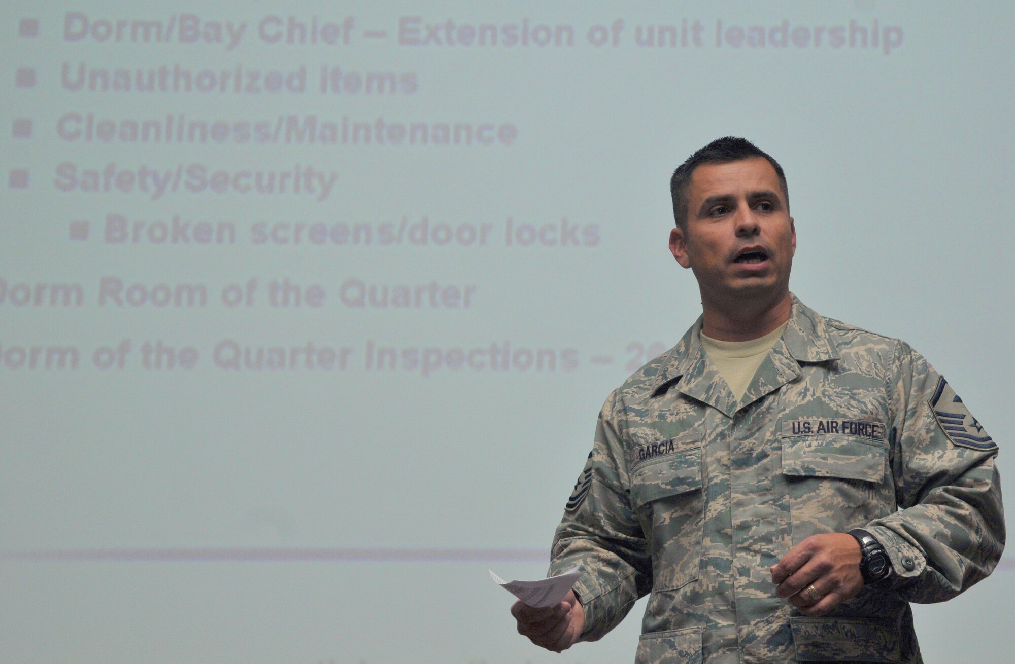 SPANGDAHLEM AIR BASE, Germany -- Master Sgt. Michael Garcia, 52nd Force Support Squadron first sergeant, briefs dorm residents on what is and isn't allowed in the dorm rooms during a dorm resident all-call Oct. 13. Key topics discussed during the briefing were dorm improvements, the no-smoking policy, base dorm council, and dorm or bay chief program. (U.S. Air Force photo/Airman 1st Class Nick Wilson)