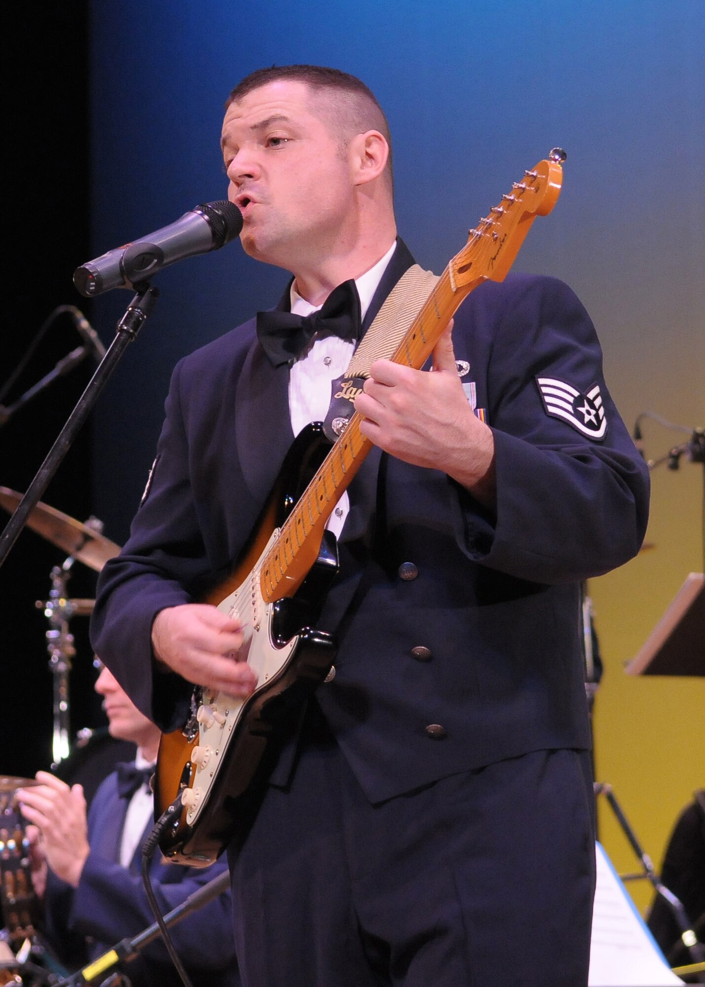 HIROSHIMA, Japan -- Staff Sgt. Daniel Bragdon, U.S. Air Force Band of the Pacific-Asia, sings "Over the Rainbow" during an Oct. 13 performance at the Aster Plaza here. The venue is mere blocks away from the Hiroshima Peace Memorial Park, dedicated to the victims of the atomic bombing of the city at the end of World War II. (U.S. Air Force photo/Airman 1st Class Sean Martin)  