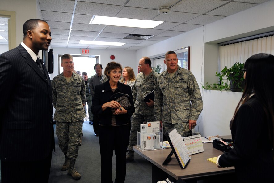 Pacific Air Forces Commander Gen. Gary North and his wife Shelley are briefed at the Airmen and Family Readiness Center after arriving at Osan Air Base Republic of Korea Oct. 7.  During the visit they both visited with Airmen and their families to discuss the way ahead for Team Osan.  ( U.S. Air Force photo/ Senior Airman Stephenie Wade)