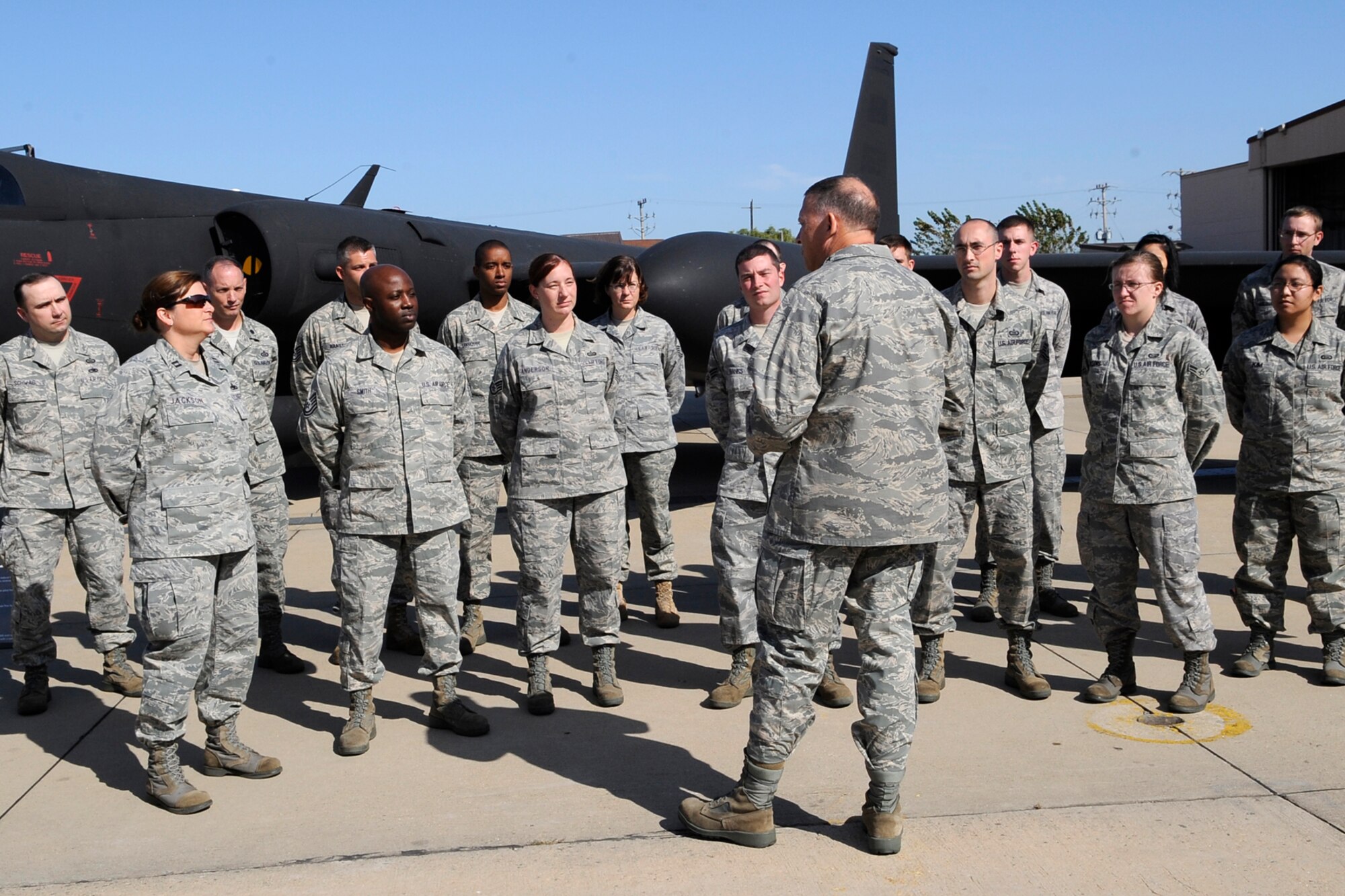 Pacific Air Forces Commander Gen. Gary North talks to Airmen of the 5th Reconnaissance Squadron on the flight line at Osan Air Base Republic of Korea Oct. 7.  During their visit Gen. North and his wife Shelley visited with Airmen and their families to discuss the way ahead for Team Osan.  (U.S. Air Force photo/Staff Sgt. Brian Ferguson)