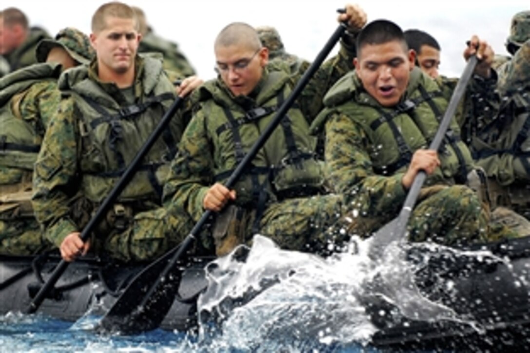 U.S. Marines disembark the amphibious dock landing ship USS Harpers Ferry during a ship-to-shore exercise in a combat rubber craft in the South China Sea, Oct. 14, 2009. The Marines are assigned to Fox Company, 2nd Battalion Landing Team, 5th Reigment, 31st Marine Expeditionary Unit.