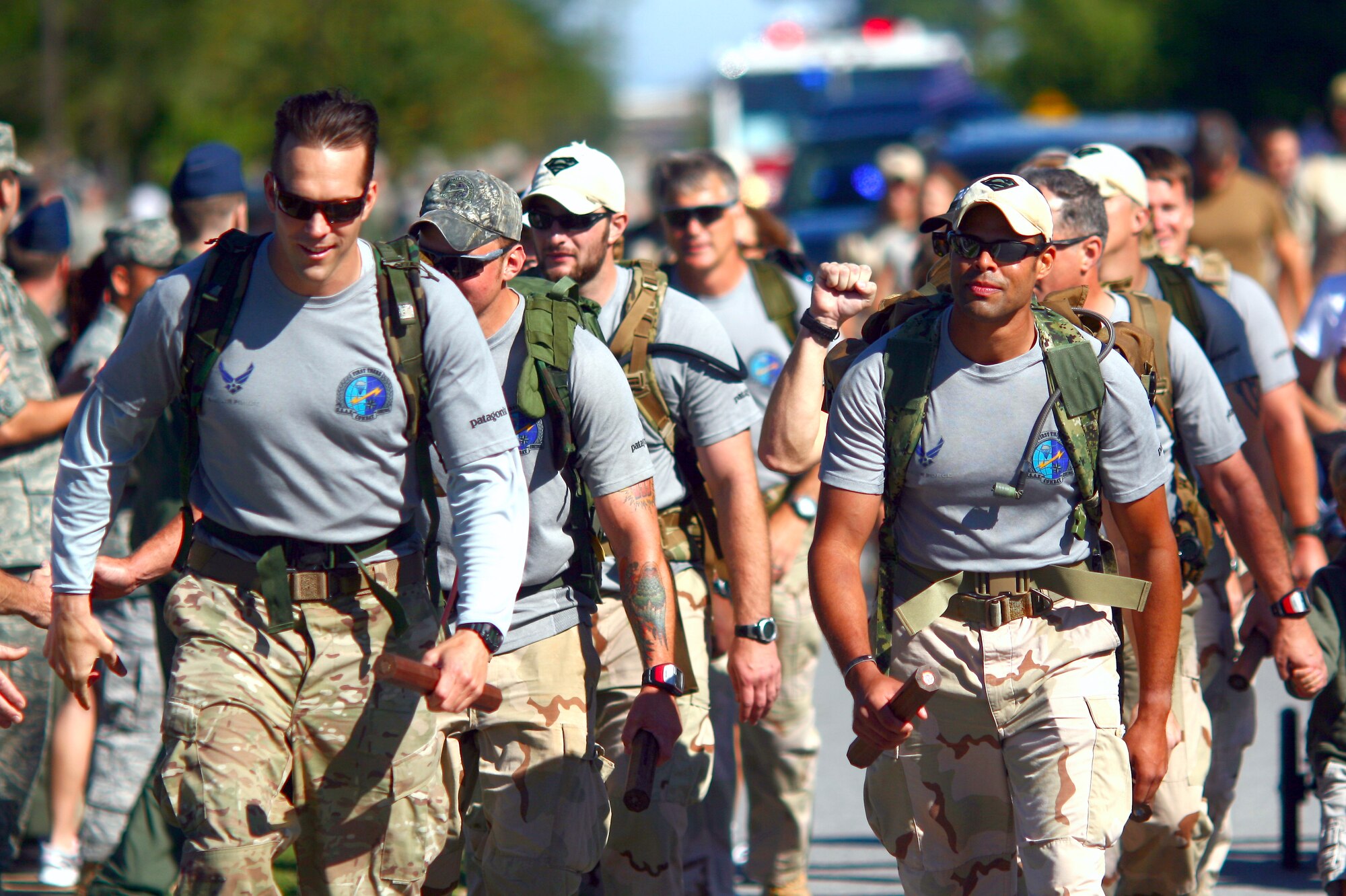 HURLBURT FIELD, Fla. -- Twelve special tactics Airmen enter the base as they conclude an 824-mile memorial rucksack march at Hurlburt Field Oct. 16, 2009. The men marched from San Antonio to Hurlburt Field to honor Staff Sgt. Timothy Davis, a combat controller assigned to the 23rd Special Tactics Squadron when Field when he was killed in action Feb. 20, 2009 and 12 other fallen special operations forces members. (U.S. Air Force photo by Drew Buchanan)
