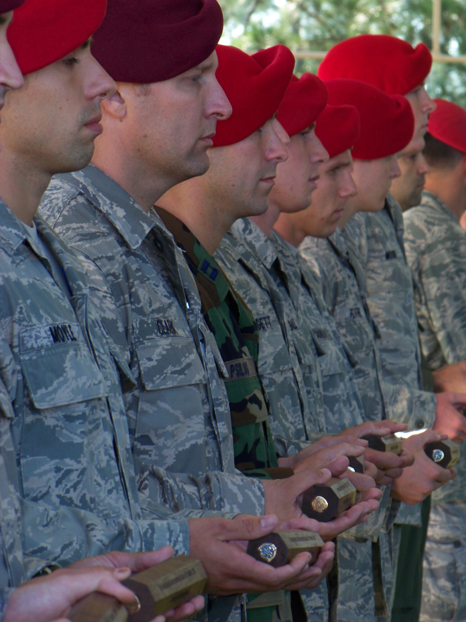 HURLBURT FIELD, Fla. -- Twelve special tactics Airmen display batons that were presented to the Special Tactics Training Squadron commander during a ceremony here Oct. 16, 2009. The batons were carried by 12 Airmen who marched from San Antonio to Hurlburt Field during a memorial rucksack march honoring fallen special operations forces members. (U.S. Air Force photo by Staff Sgt. Mareshah Haynes)