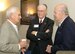 Retired Air Force leaders gathered Oct. 9 to learn the latest goals, concerns and successes of Tinker and the Air Force during a day-long Re-Blueing conference held here.  John Clabes, retired Tinker Protocol and Public Affairs chief, retired Maj. Gens. Carl Schneider and Jay Edwards, from left, were a few of the attendees. General Schneider was the Oklahoma City Air Logistics Center commander from 1976 to 1977 and General Edwards was the center commander from 1980 to 1982.  (Air Force photo by Margo Wright)