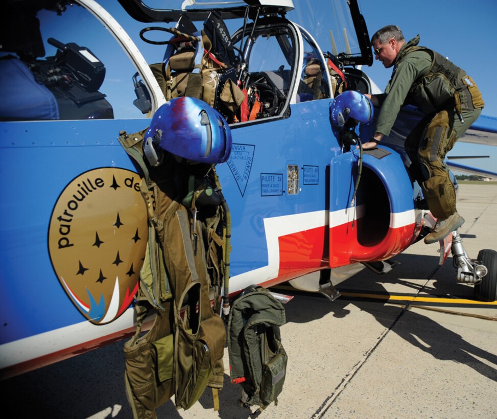 Lieutenant Gen. Mark D. "Shack" Shackelford climbs into the Dassault/Dornier Alpha Jet belonging to the Patrouille Acrobatique de France ("French Acrobatic Patrol") for an incentive flight. General Shackelford is the military deputy for the Office of the Assistant Secretary of the Air Force for Acquisition at the Pentagon, Washington, D.C. The general was an experimental test pilot in the F-16, the first Air Force pilot to fly the YF-22 Advanced Tactical Fighter prototype and managed the F-22 Cockpit Development Program and directed the T-38, F-5, F-16 and F-22 programs. (U.S. Air Force photo by Senior Airman Steven R. Doty)