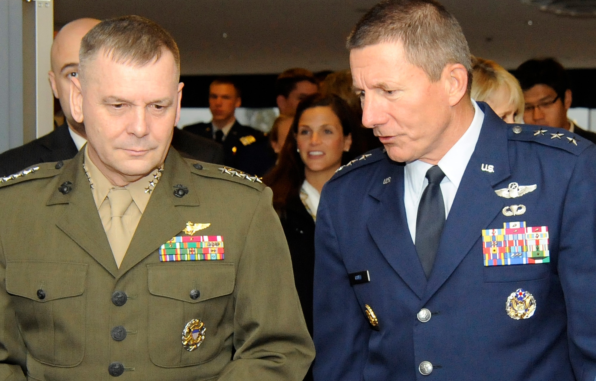 Marine Gen. James Cartwright talks with Lt. Gen. Michael Gould before the Academy Assembly keynote speech at the Air Force Academy's Arnold Hall Theater Oct. 8, 2009. The theme for the 2009 Academy Assembly was "Building the Bridge from War to Peace: Defining Interagency Roles in Rebuilding a Nation." General Cartwright is the vice chairman of the Joint Chiefs of Staff. General Gould is the Academy superintendent. (U.S. Air Force photo/Rachel Boettcher)
