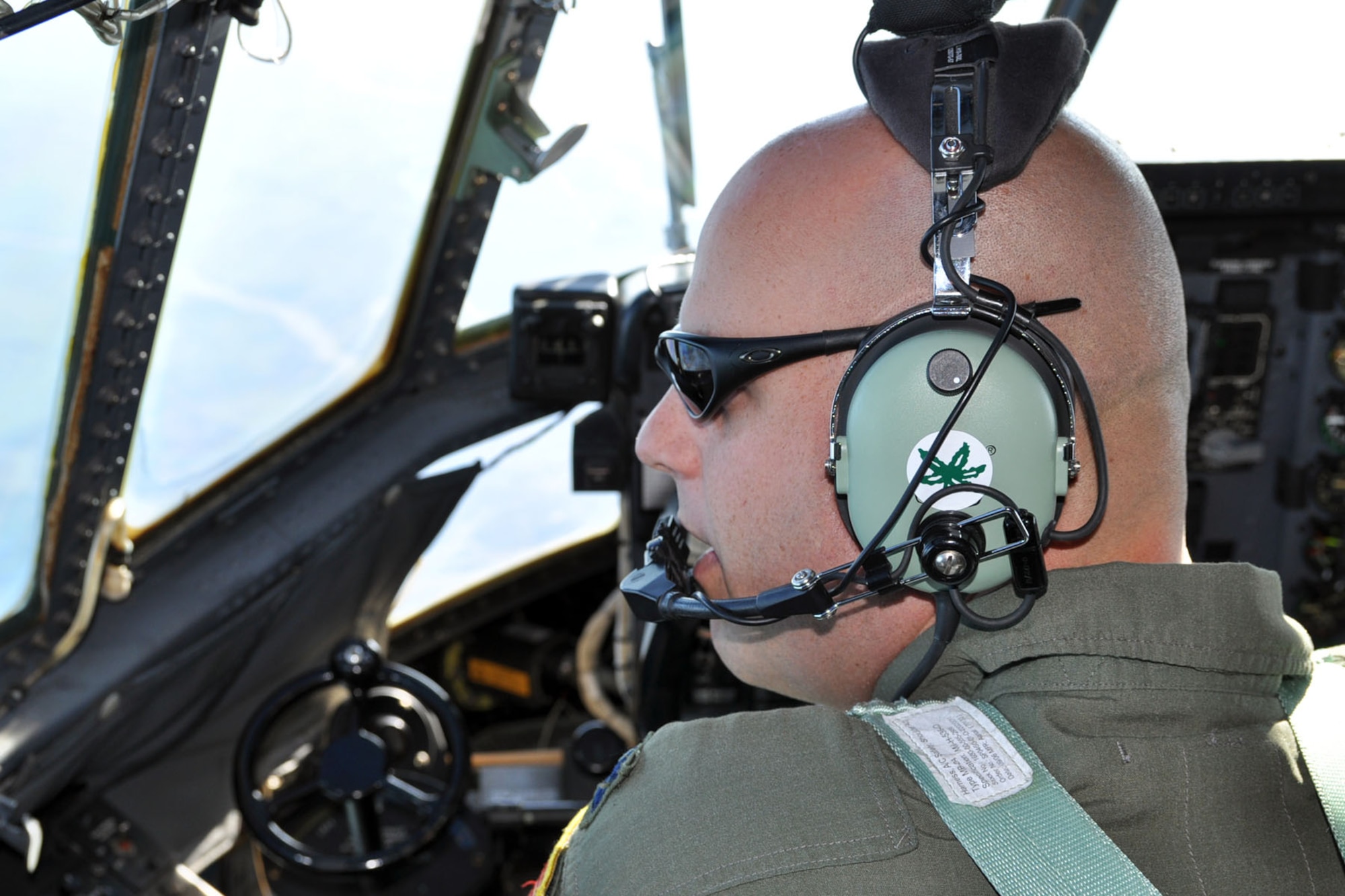 ABOVE THE NETHERLANDS NORTH SEA COAST ? Air Force Reserve Capt. Brian Hodor, a pilot assigned to the 757th Airlift Squadron, watches through the cockpit windows of a C-130H Hercules tactical cargo transport aircraft for a jet fighter interceptor from the Royal Netherlands Air Force during a flight from Prestwick, Scotland to Ramstein Air Base, Germany, October 14. The fighter was scheduled to meet the C-130 as it flew from over the North Sea into Ducth air space. Capt. Hodor and his fellow Reservists from the 910th Airlift Wing, based at Youngstown Air Reserve Station, Ohio, are bound for Ramstein in support of Operation Joint Enterprise. The C-130 crews and maintainers participating in Joint Enterprise will work together to airlift cargo to locations in the U.S. Europe Command (EUROCOM) and the U.S. Africa Command (AFRICOM) Theaters of Operation. U.S. Air Force photo by Master Sgt. Bob Barko Jr.