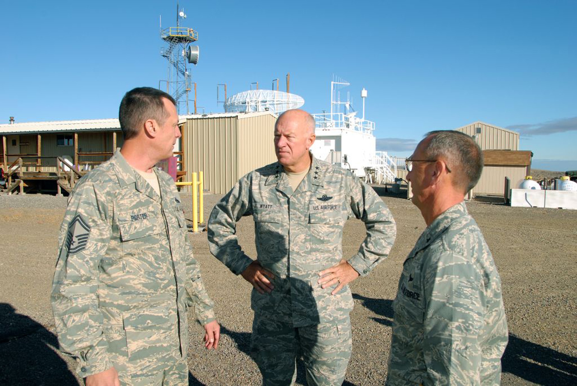 Lt. Gen. Harry M. Wyatt III (center) talks with Senior Master Sgt. Robert Porter (left) and Brig. Gen. Gary Sayler during a visit Oct. 15, 2009, to the 266th Range Squadron, a geographically separated unit about 100 miles from Boise, Idaho, in the Owyhee Desert. General Wyatt, the director of the Air National Guard, was in Boise for the ANG Maintenance Group Mega-Conference Oct. 15, 2009. (U.S. Air Force photo/Master Sgt. Tom Gloeckle) 
