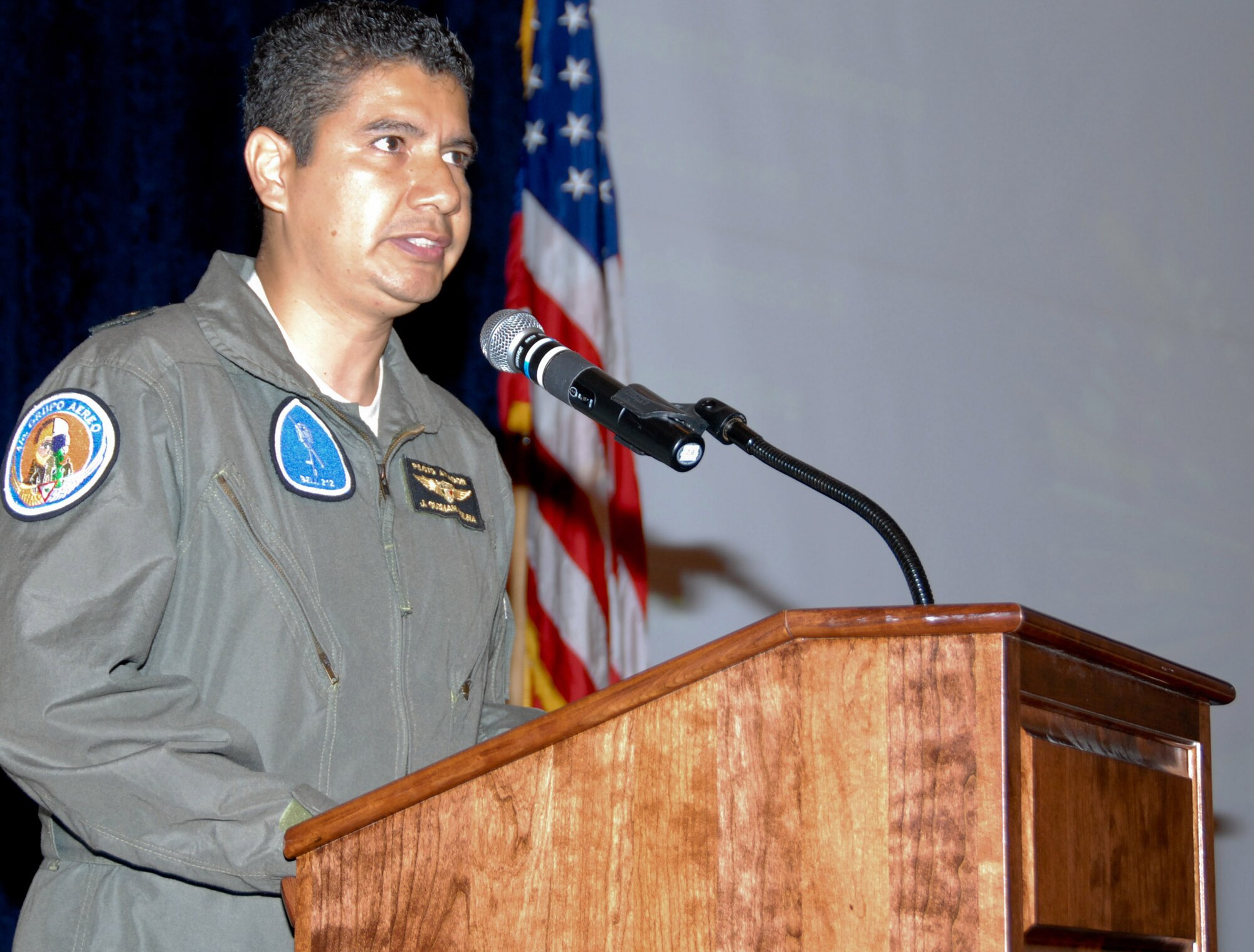 Air War College international student, Lt. Col. Joel Guzman-Molina of the Mexican air force, talks to lunch guests about the heritage of Mexico and the importance of Hispanic members in the U.S. Air Force. Colonel Guzman-Molina was the guest speaker for this year's Hispanic Heritage Month lunch at the Maxwell Officers' Club Tuesday. (U.S. Air Force photo/Bennett Rock)