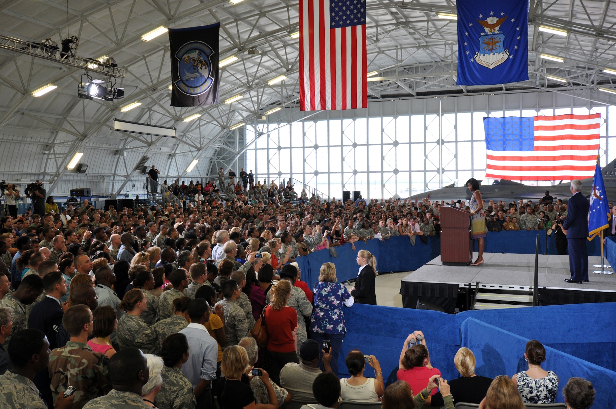 The First Lady of the United States, Michelle Obama, visited Eglin Oct. 15 and addressed a crowd of military, family and civic leaders in Hangar 103. She personally spoke earlier with Team Eglin service members and their spouses on their experiences serving the military. The First Lady's focus was on the Air Force's Year of the Military Family and on the contributions the military gives and receives from the local community. (U.S. Air Force Photo/Amn Anthony Jennings)