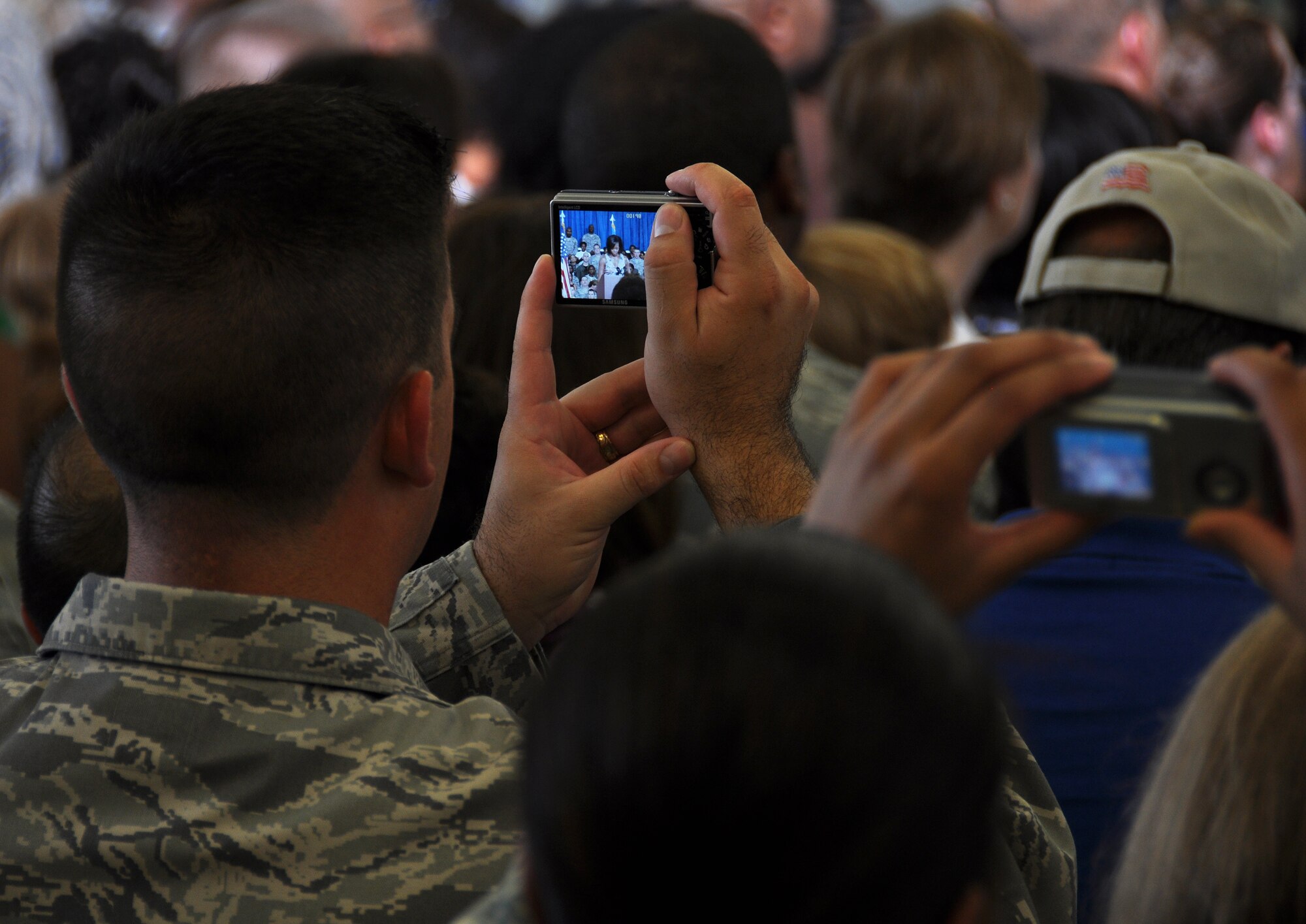 The First Lady of the United States, Michelle Obama, visited Eglin Oct. 15 and addressed a crowd of military, family and civic leaders in Hangar 103. She personally spoke earlier with Team Eglin service members and their spouses on their experiences serving the military. The First Lady's focus was on the Air Force's Year of the Military Family and on the contributions the military gives and receives from the local community. (U.S. Air Force Photo/Staff Sgt. Bryan Franks)