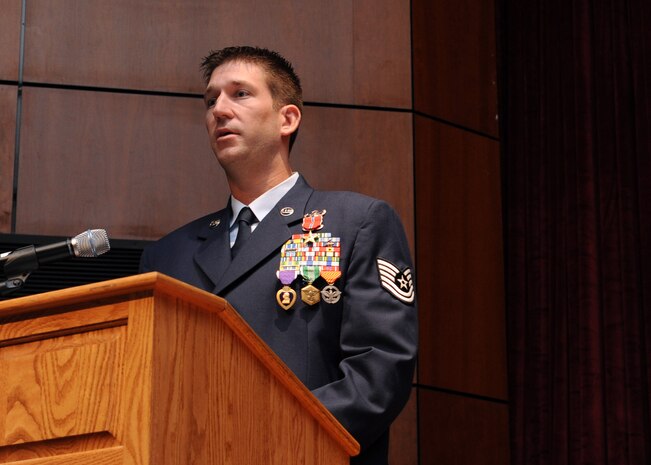 Tech. Sgt. Michael Williams speaks during his medal presentation ceremony at the Charleston AFB theater Oct. 15. Sergeant Williams received the Bronze Star Medal with Valor, the Purple Heart, the Army Commendation Medal and the Air Force Combat Action Medal for his heroic acts while deployed to Afghanistan. Sergeant Williams is an explosive ordnance technician with the 437th Civil Engineer Squadron. (U.S. Air Force photo/Senior Airman Katie Gieratz)