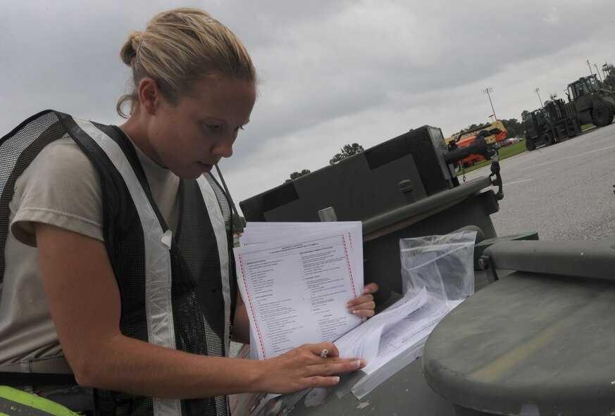 MOODY AIR FORCE BASE, Ga. -- Staff Sgt. Lisa Angove, 23rd Logistics Readiness Squadron assistant NCO in-charge of transportation, checks in cargo during the Phase I Operational Readiness Exercise here Oct. 14. The purpose of this ORE is to test the 23rd Wing’s ability to rapidly deploy personnel and equipment. (U.S. Air Force photo by Staff Sgt. Elizabeth Rissmiller)