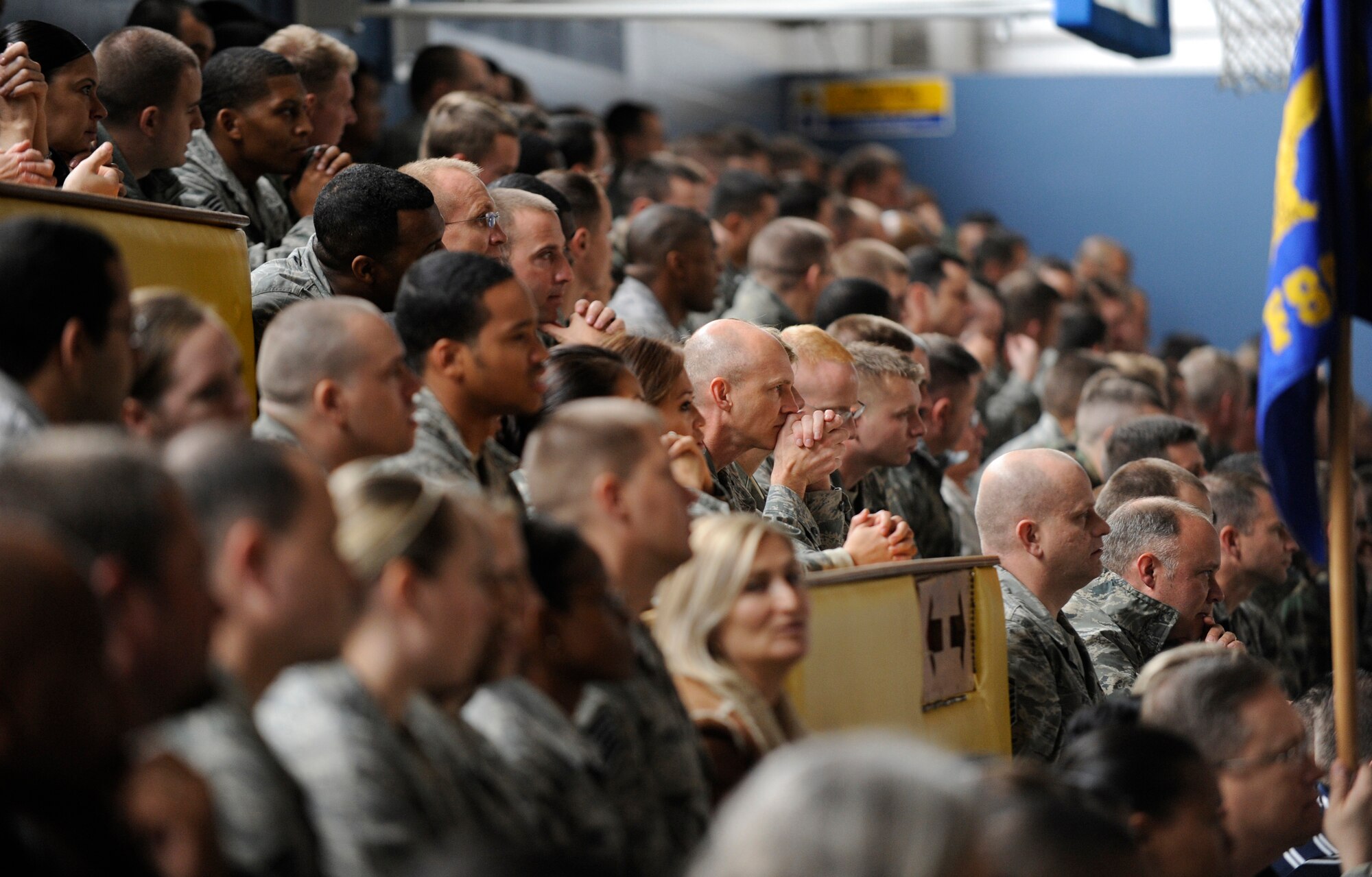 RAF MILDENHALL, England -- Hundreds of members of the 100th Air Refueling Wing listen as the results of the Operational Readiness Inspection are announced by the U.S. Air Forces in Europe Inspector General team Oct. 16.  The wing finished the inspection with a "satisfactory" rating.  (U.S. Air Force photo/Staff Sgt. Christopher L. Ingersoll)