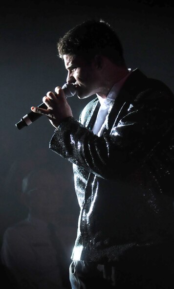 U.S. Air Force Senior Airman Johnny Magbanua, 90th Security Support Squadron, Security Forces Journeyman, performes for military members and their families during the Tops in Blue's performance October 15, 2009, Ramstein Air Base Germany.  Each year Air Force personnel worldwide compete in base talent contests and the most talented move on to higher levels of competition.  The result is an elite group composed of approximately 35 of the most talented competitors.  Their main purpose is to perform for military personnel and their families throughout the world.  (U.S. Air Force Photo by: Tech. Sgt. Sean M. White)