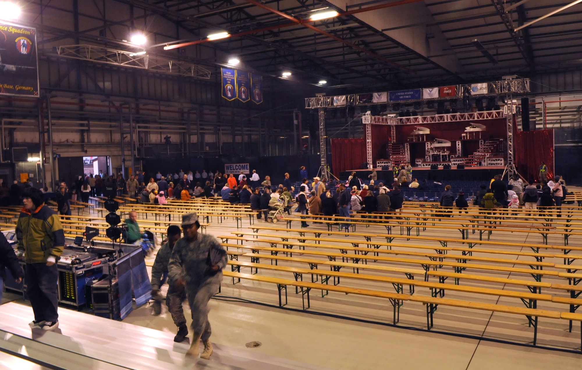 Members assigned in the Kaiserslautern local community quickly filled an entire aircraft hangar in anticipation of the Tops in Blue performance October 15, 2009, Ramstein Air Base Germany.  Tops in Blue put on an amazing performance on October 15, 2009, Ramstein Air Base Germany, but it wouldn't have been possible without numerous of volunteers headed by members of the 86th Services Squadron.  (U.S. Air Force Photo by: Tech. Sgt. Sean M. White)