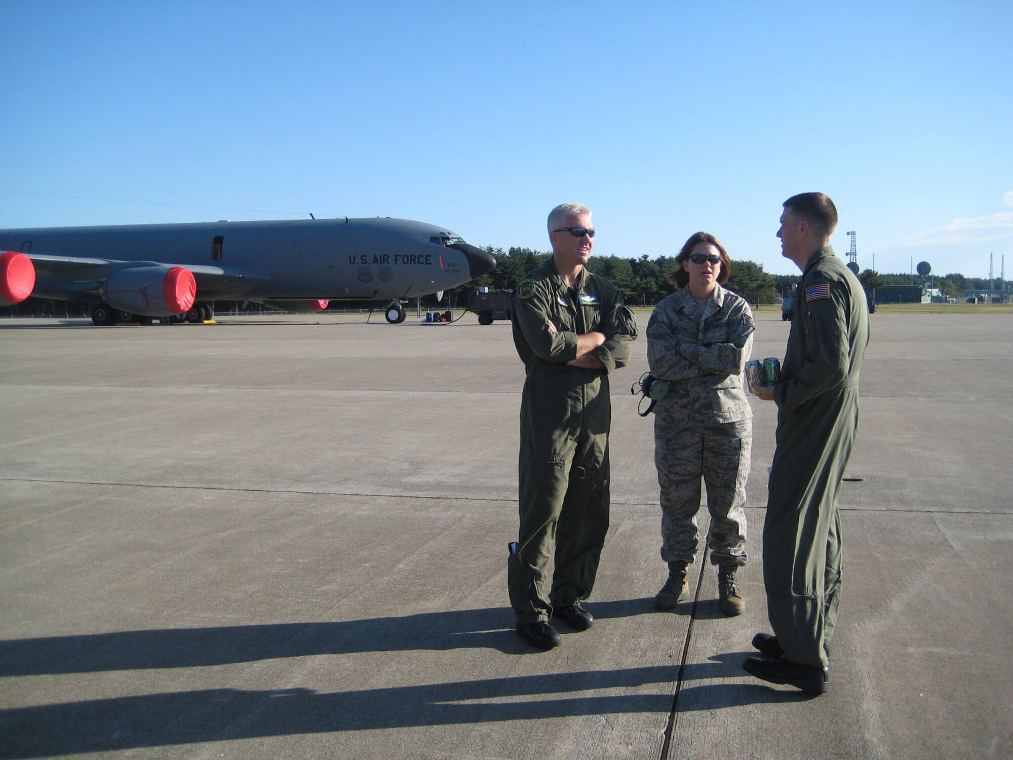 SEYMOUR JOHNSON AIR FORCE BASE, N.C. -- Deployers from the 916th Air Refueling Wing talk on the flightline at Andersen Air Force Base, Guam.