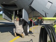 SEYMOUR JOHNSON AIR FORCE BASE, N.C. -- Maintainers from the 916th Air Refueling Wing work on a deployed KC-135R while stationed in Guam.