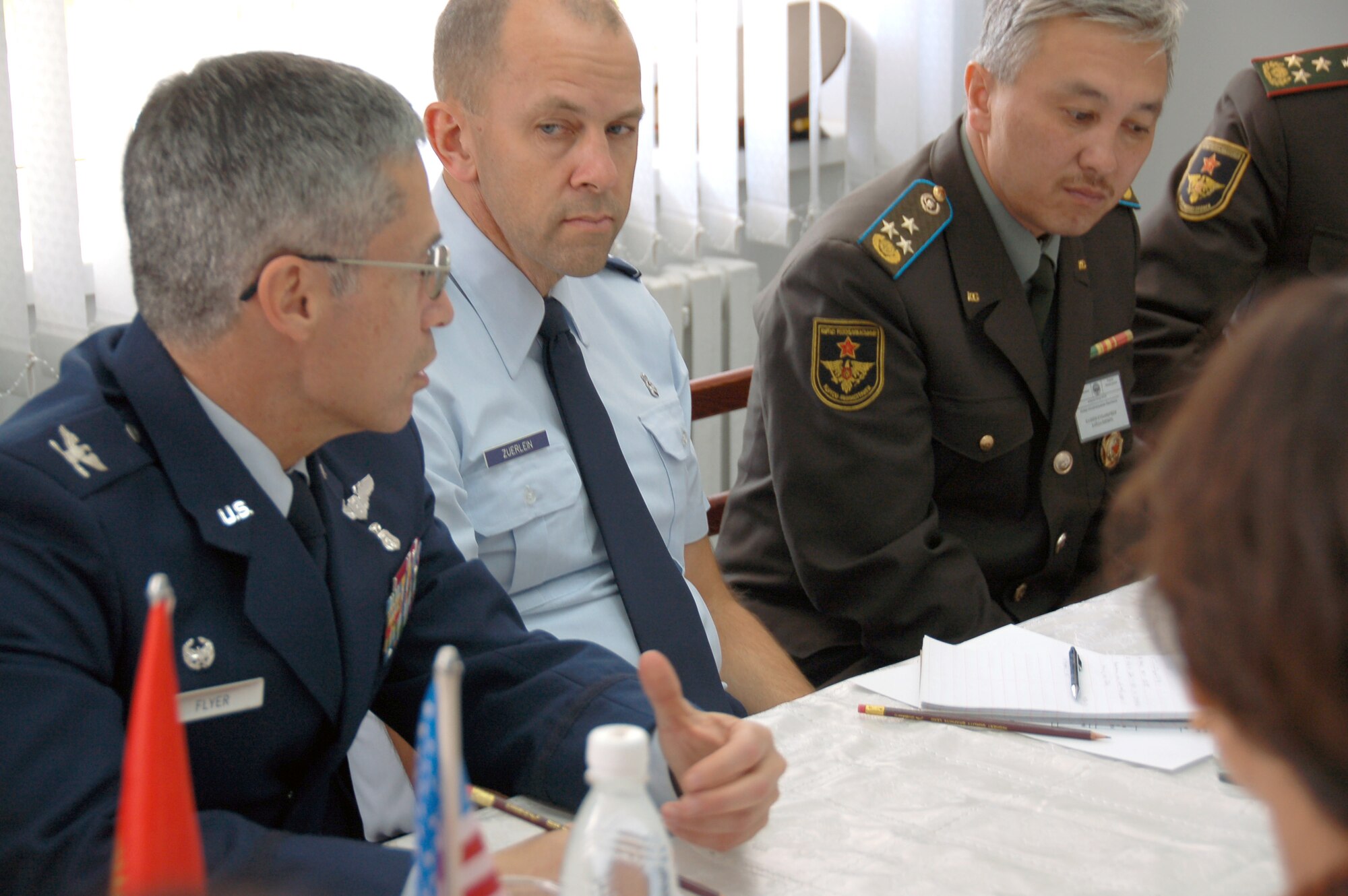 Col. Jerrold Flyer, 376th Expeditionary Medical Group commander, briefs Kyrgyz Col. Iskender Abykeev, commander of the military medical department at the Kyrgyz Ministry of Defense, and Col Kuvanychbek Kaliev, head of the Besh-Kungei military hospital, on how to work together with Airmen at the Transit Center at Manas to improve their newly built hospital during a visit to the military hospital, Kyrgyzstan, Oct. 14, 2009.   Colonel Flyer led a team of seven Airmen that attended the opening ceremony of the newly built Besh-kungei hospital.  The hospital’s building contract, which cost about $1.8 million, was funded by the U.S. State Department.  (U.S. Air Force photo/Staff Sgt. Olufemi Owolabi)  