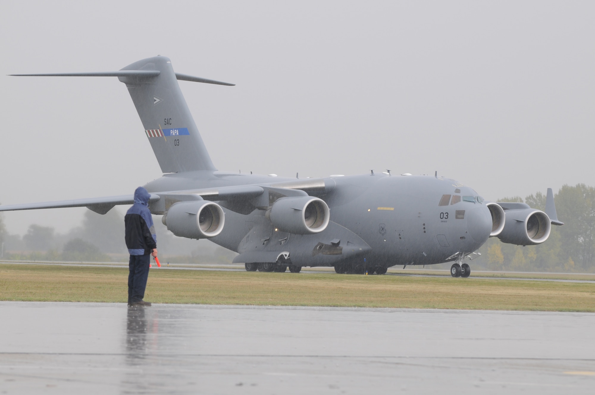 A C-17 Globemaster III taxis to a parking spot on Oct. 12, 2009 at Papa Air Base, Hungary. The C-17 is the third and final aircraft to be delivered to the Heavy Airlift Wing. The wing’s purpose is to collectively create a heavy airlift solution with global reach to meet national obligations to the European Union, NATO and U.N. (U.S. Air Force photo/Staff Sgt. Mercedes Crossland)