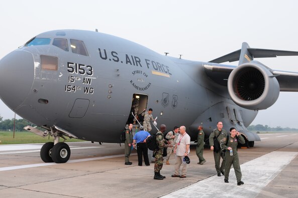 Pacific Air Forces Airmen arrive at Agra Air Force Station, India, on a Hickam-based C-17 Globemaster III Oct. 15, after a long flight from Kadena Air Base, Japan, for exercise Cope India. Cope India is a humanitarian assistance and disaster relief exercise with the Indian Air Force scheduled to begin Oct. 19. (U.S. Air Force photo by Capt. Genieve David/RELEASED).
