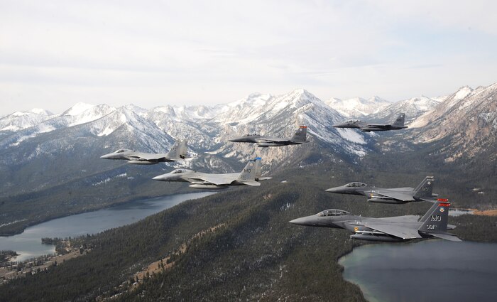 A six-ship formation of F-15C Eagle and F-15E Strike Eagles from the 366th Fighter Wing, Mountain Home Air Force Base, Idaho fly over the Sawtooth Mountains in Idaho Oct 13, 2009. (U.S. Air Force photo/ Master Sgt. Kevin J. Gruenwald) released