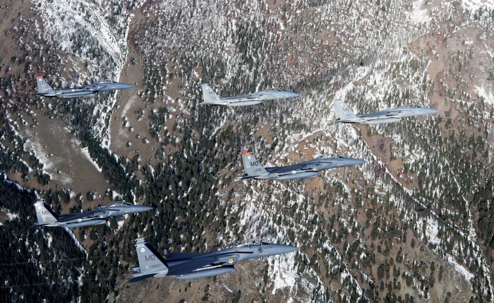 A six-ship formation of F-15C Eagle and F-15E Strike Eagles from the 366th Fighter Wing, Mountain Home Air Force Base, Idaho fly over the Sawtooth Mountains in Idaho Oct 13, 2009. (U.S. Air Force photo/ Master Sgt. Kevin J. Gruenwald) released