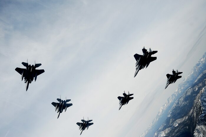A six-ship formation of F-15C Eagle and F-15E Strike Eagles from the 366th Fighter Wing, Mountain Home Air Force Base, Idaho fly over the Sawtooth Mountains in Idaho Oct 13, 2009. (U.S. Air Force photo/ Master Sgt. Kevin J. Gruenwald) released