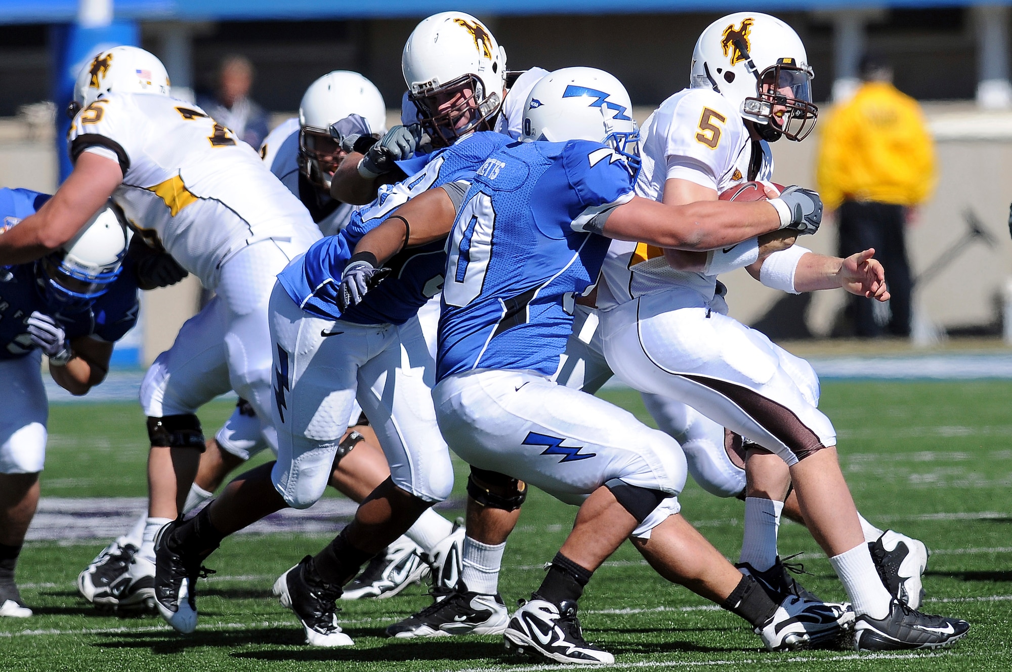 Falcons junior defensive end Rick Ricketts sacks Cowboys quarterback Austyn Carta-Samuels during the Air Force-Wyoming game at Falcon Stadium Oct 17, 2009. Ricketts, a native of San Jose, Calif., had one of the Falcons defense's six sacks on the day. (U.S Air Force photo/Rachel Boettcher)