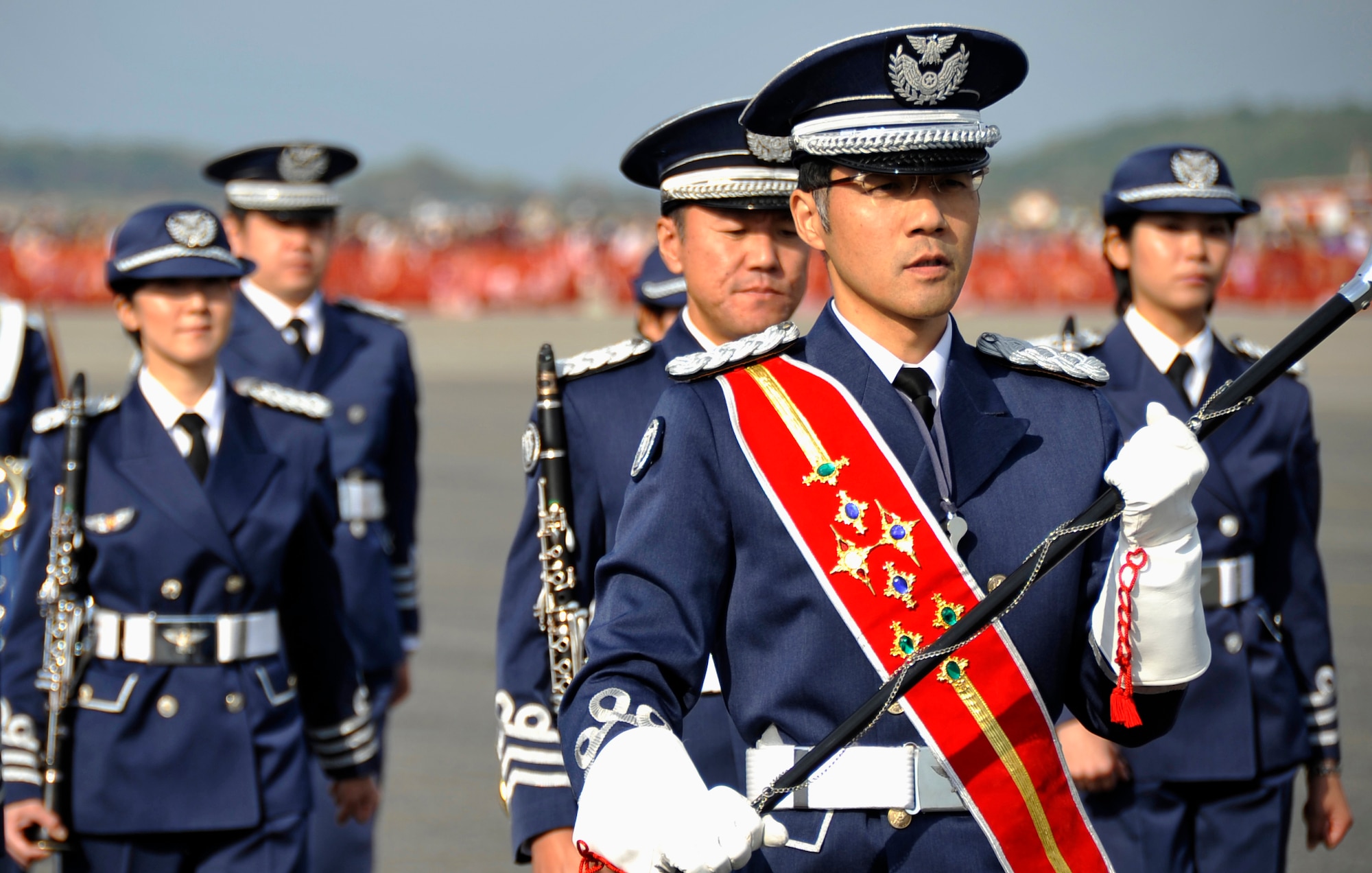 MISAWA AIR BASE, Japan -- The Japan Air Self-Defense Force band marches down the taxiway after the opening ceremony during Air Fest 2009 Oct. 18. (U.S. Air Force photo/Staff Sgt. Chad C. Strohmeyer)