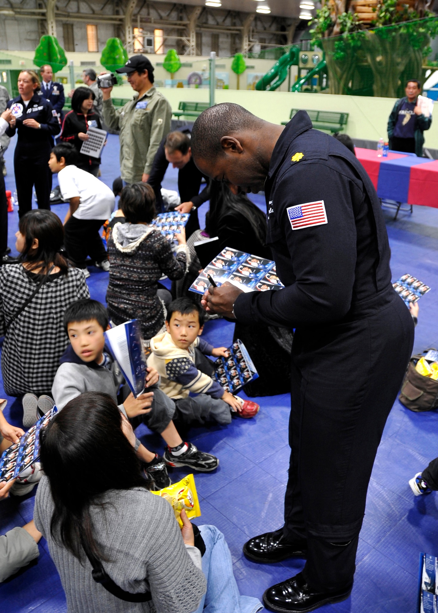 MISAWA AIR BASE, Japan --  U.S. Air Force Thunderbirds pilots answer questions and sign autographs at the Weasels' Den after their performance during Air Fest 2009 Oct. 18. (U.S. Air Force photo/Staff Sgt. Chad C. Strohmeyer)
