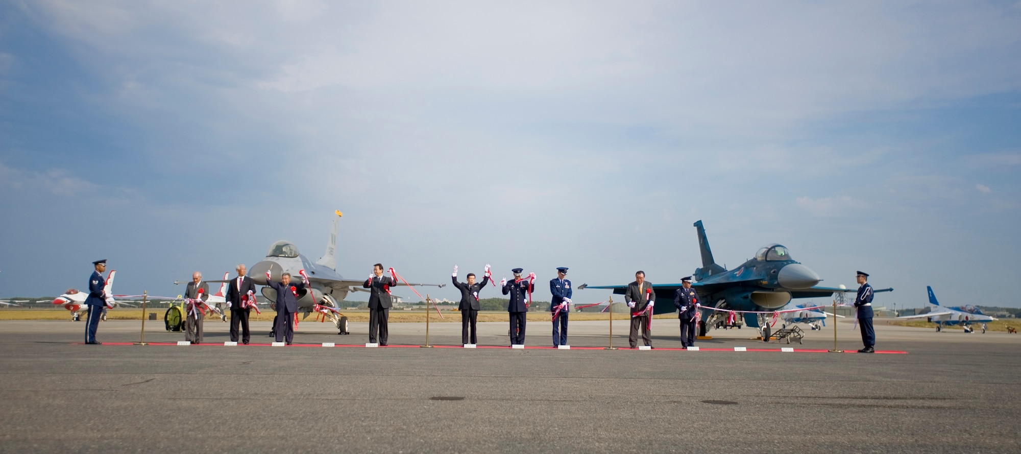 MISAWA AIR BASE, Japan -- Distinguished guests cut the ribbon during the opening ceremony of Misawa Air Fest 2009 Oct. 18. (U.S. Air Force photo/Senior Airman Jamal D. Sutter)